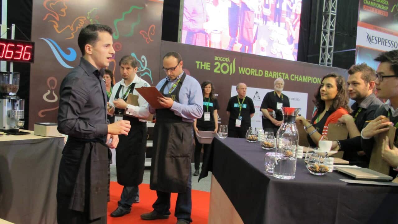 Yakup Ayden, the Dutch champion, has 15 minutes to prepare espressos, cappuccinos and his own signature drink for a six-member team of judges, four who taste his concoctions and two who carefully check out his techniques. Photographed in Bogota, Colombia