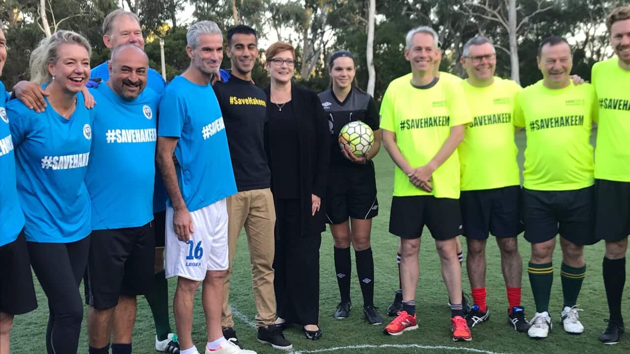 Hakeem Al-Araibi, flanked by Foreign Minister Marise Payne and Craig Foster, joined Senators for a morning football match.