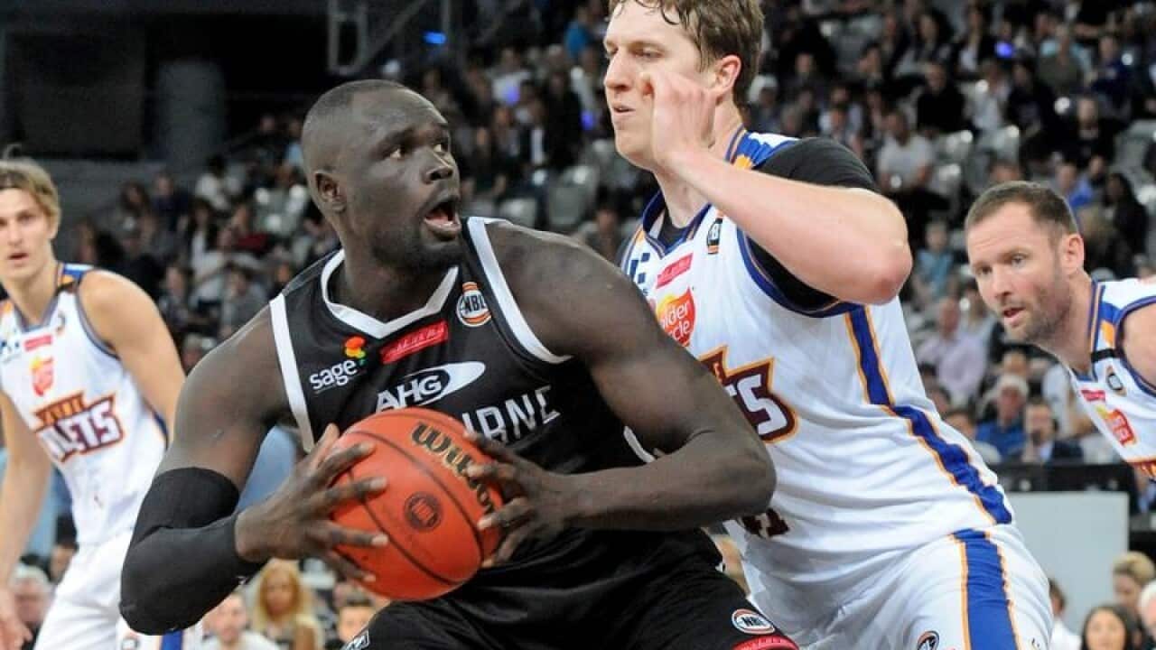 A file image of Brisbane Bullets player Cameron Bairstow (R)