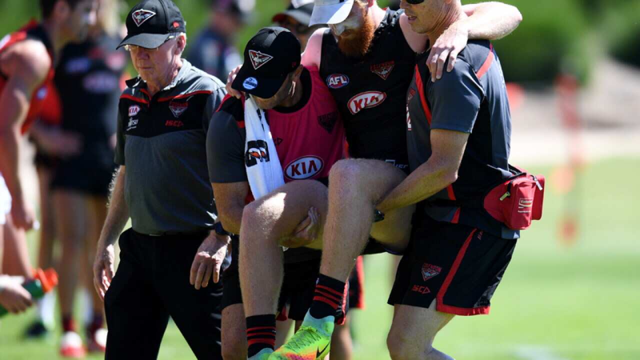 Aaron Francis is carried off the field