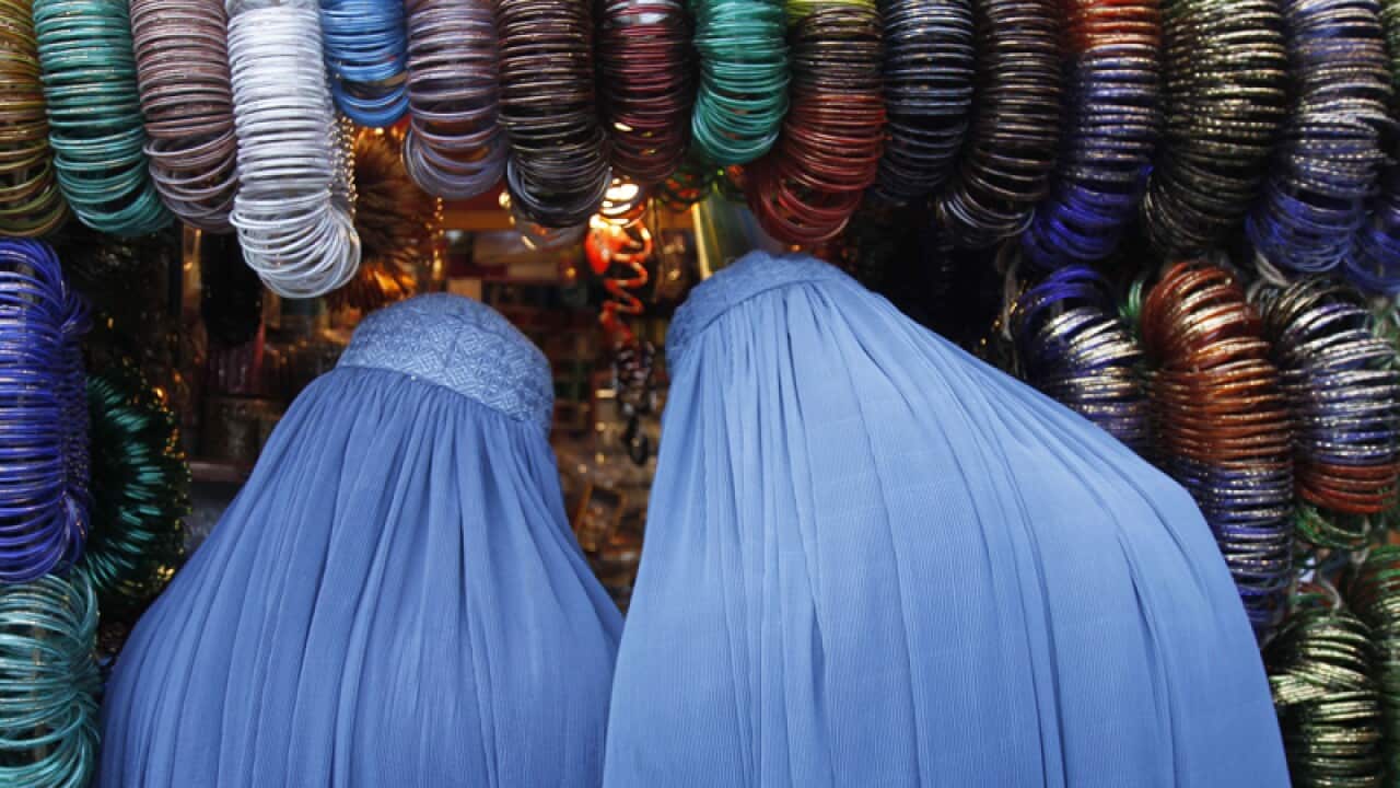 Afghan women buy bangles in Jalalabad in eastern Afghanistan