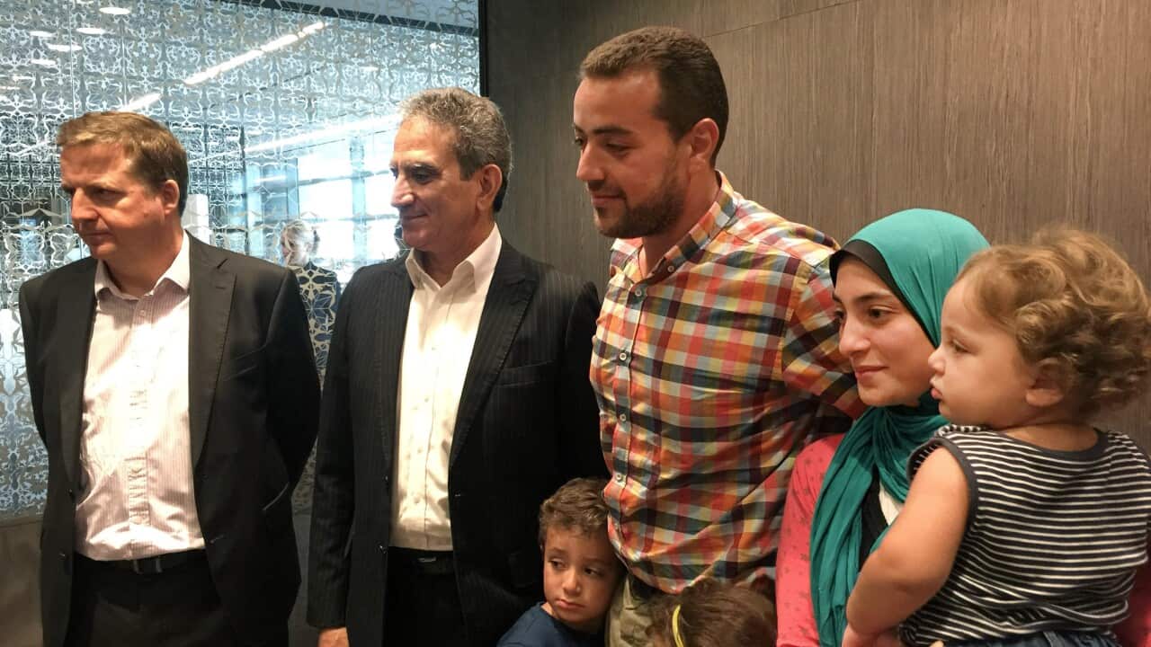 Egyptian Al-Jazeera English journalist Baher Mohammed and his family are welcomed by his colleagues upon his arrival to Doha