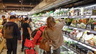 Shoppers browsing at a supermarket