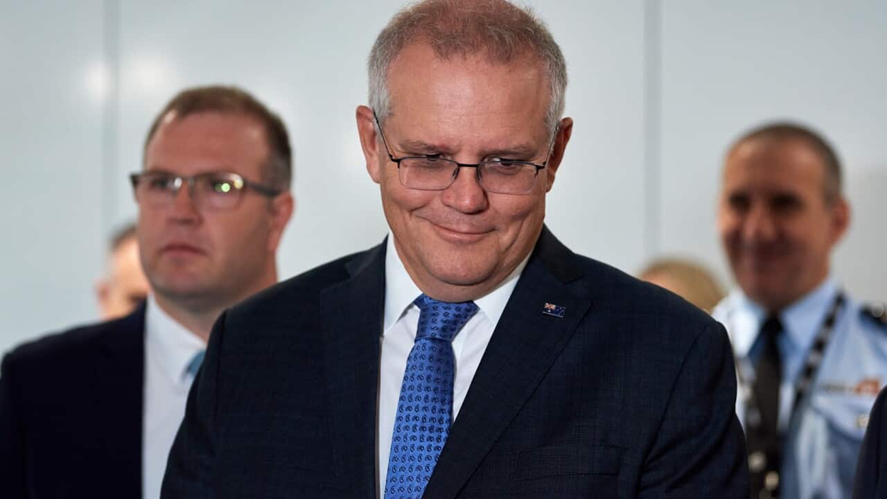 Prime Minister Scott Morrison during a visit to the Australian Federal Police Operations Centre in Perth, Wednesday, June 9, 2021. (AAP Image/Stefan Gosatti) NO ARCHIVING