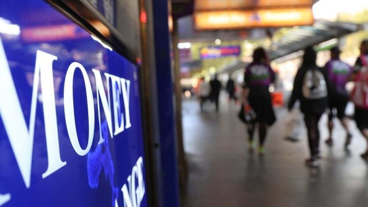 Money sign in commercial street.