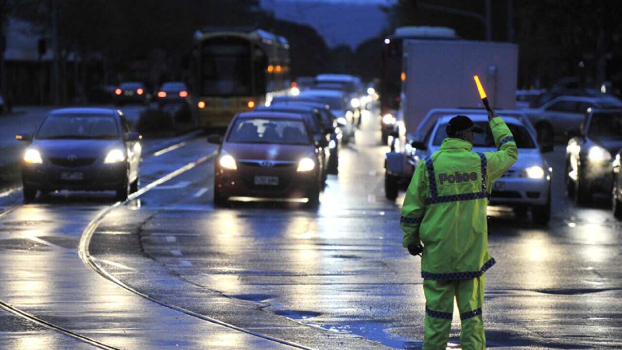 Police direct traffic around the CBD in Adelaide