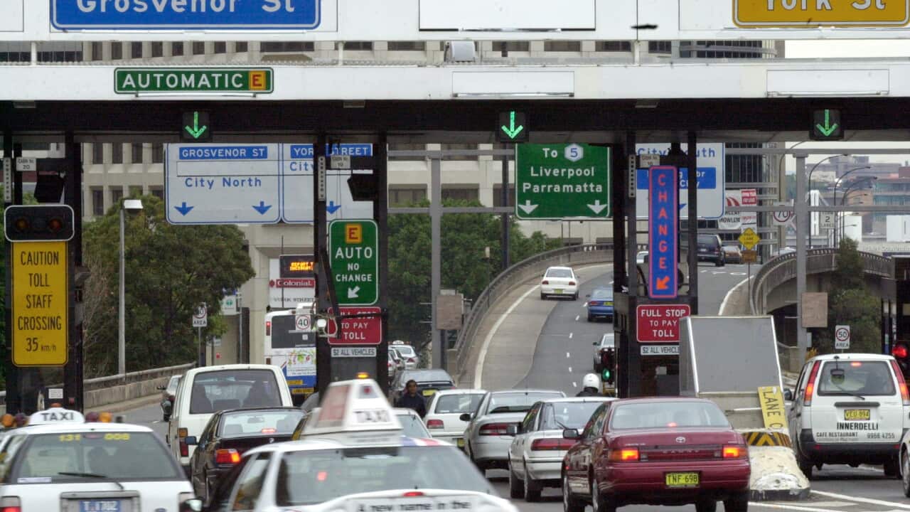 (SYD312) Sydney. 20th June, 2000. GST stock pictures. Toll booths on the Harbour Bridge will also attract GST. (AAP PHOTO/Dean Lewins).