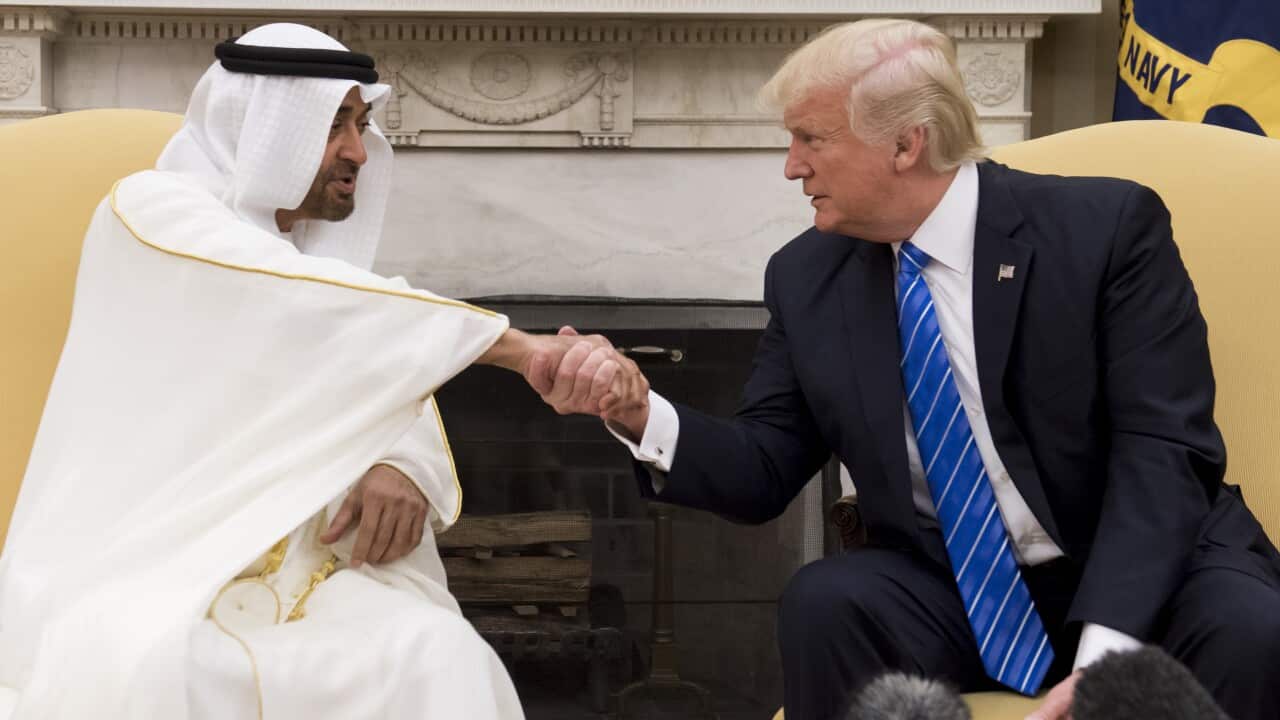 US President Donald Trump shakes hands with Crown Prince Mohammed Bin Zayed Al Nahyan of Abu Dhabi during a meeting in the Oval Office of the White House in Washington, DC, May 15, 2017. / AFP PHOTO / SAUL LOEB (Photo credit should read SAUL LOEB/A
