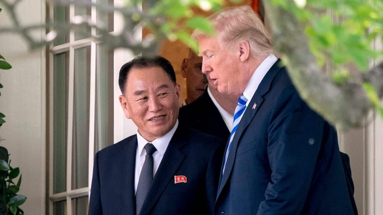 Former North Korean military intelligence chief Kim Yong-chol and President Donald Trump walk out of the Oval Office.