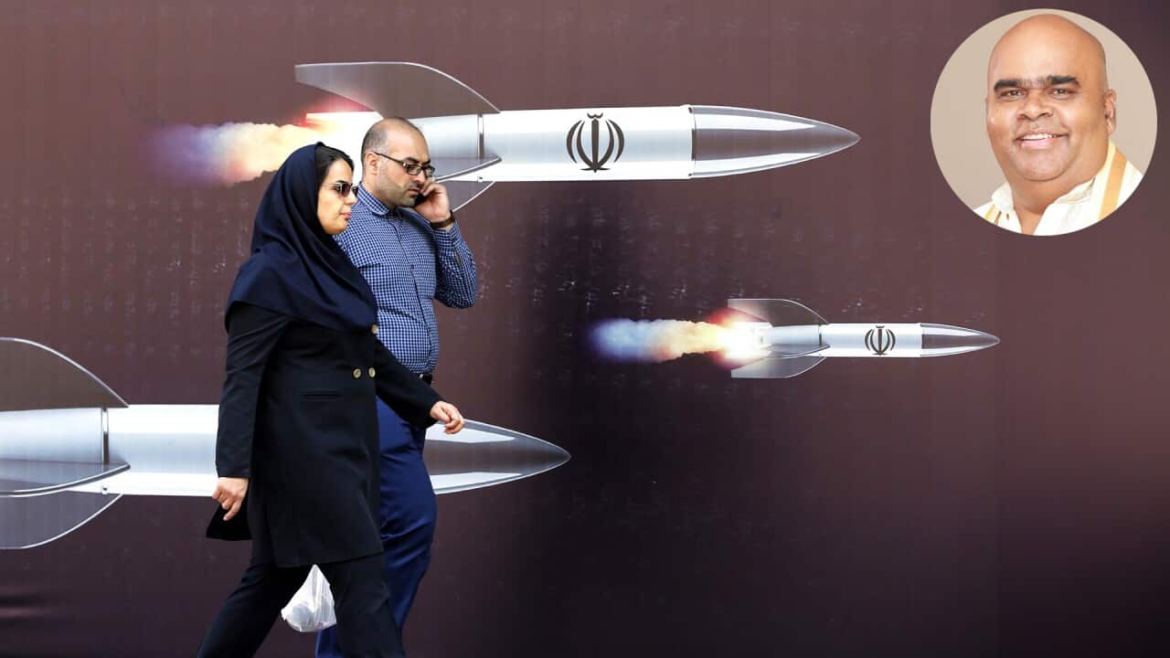 Iranian people walk past a huge anti-Israeli banner carrying pictures of missiles, in Tehran, Iran (AAP); Inset: Ainkaran Wigneswara