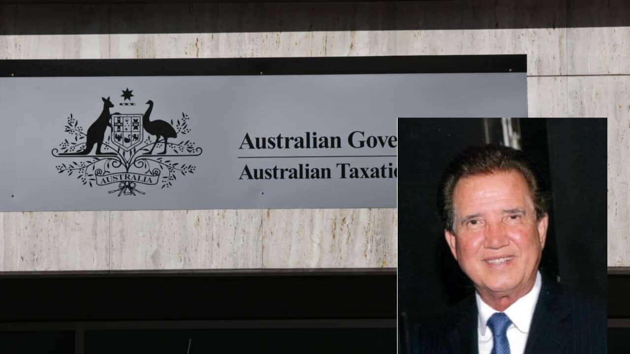 Jim Raptis with ATO banner in background