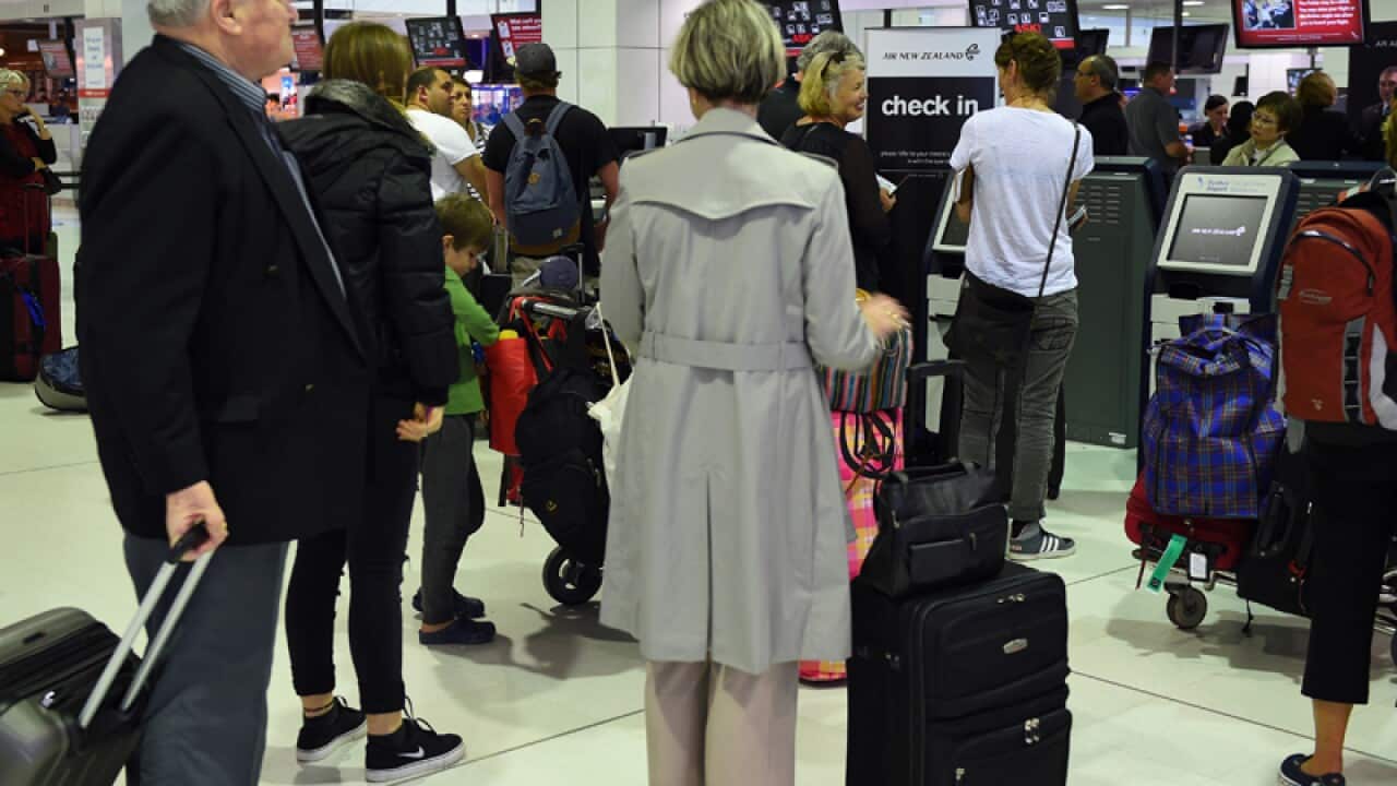 Travellers at Sydney International Airport