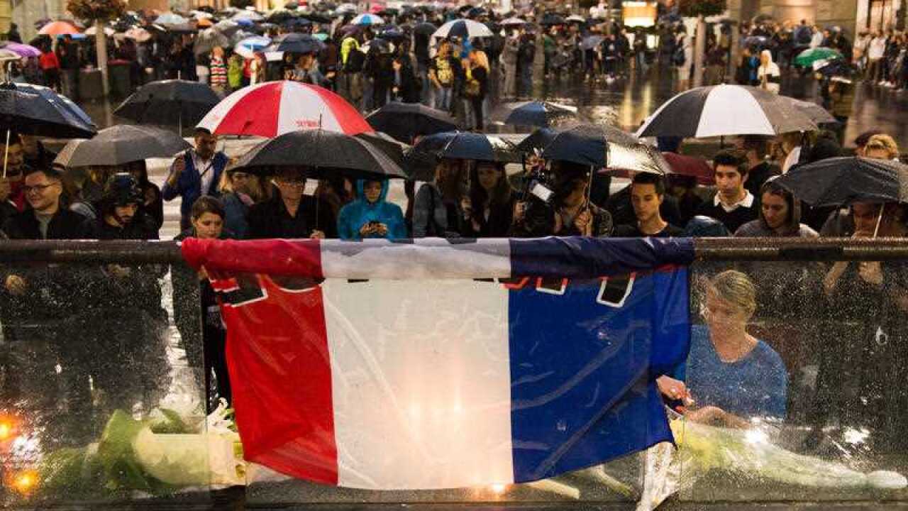 Hundreds of Sydney residents gather at a vigil in Martin Place