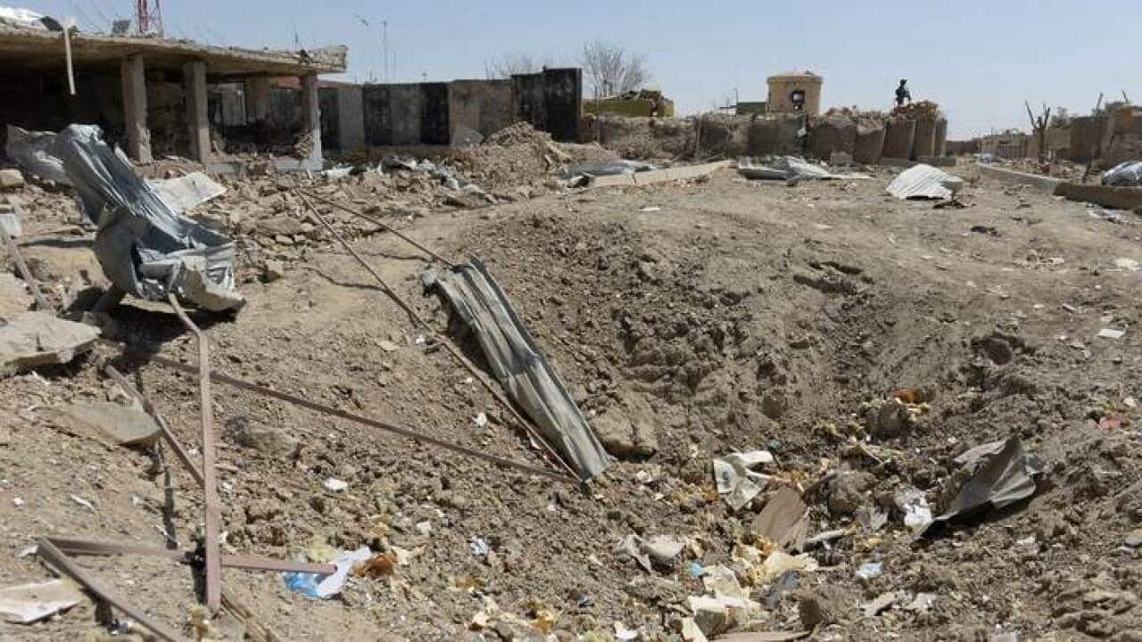 crater_from_a_recent_taliban_suicide_attack_aap_larger.jpg
