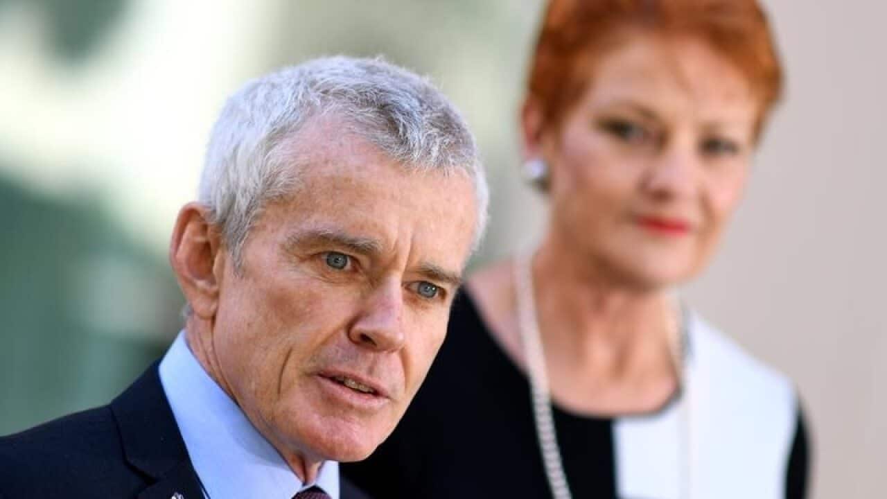 He's back... Malcolm Roberts with party leader Pauline Hanson.