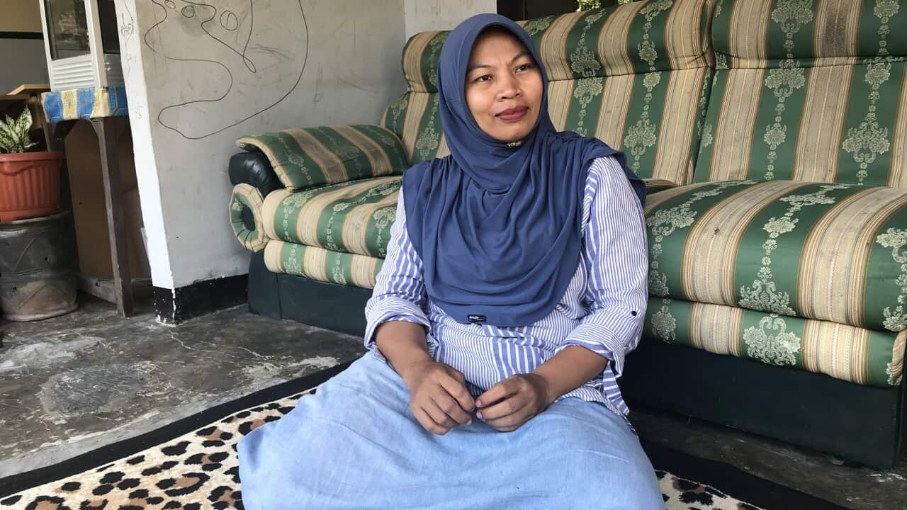 Nuril Maknun, a bookkeeper who went to jail for six months after recording a phone call in which her boss sexually harassed her, in Labuapi, Indonesia.