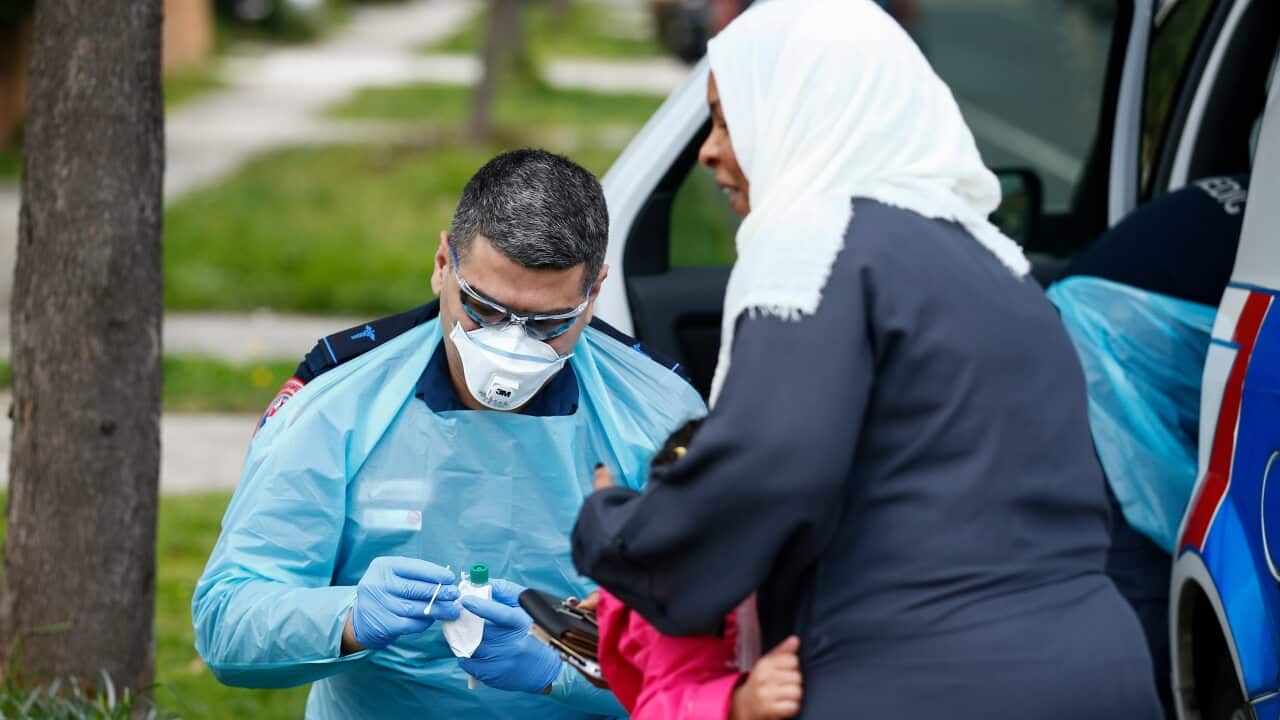 Paramedics perform COVID19 tests in Broadmeadows, Victoria.