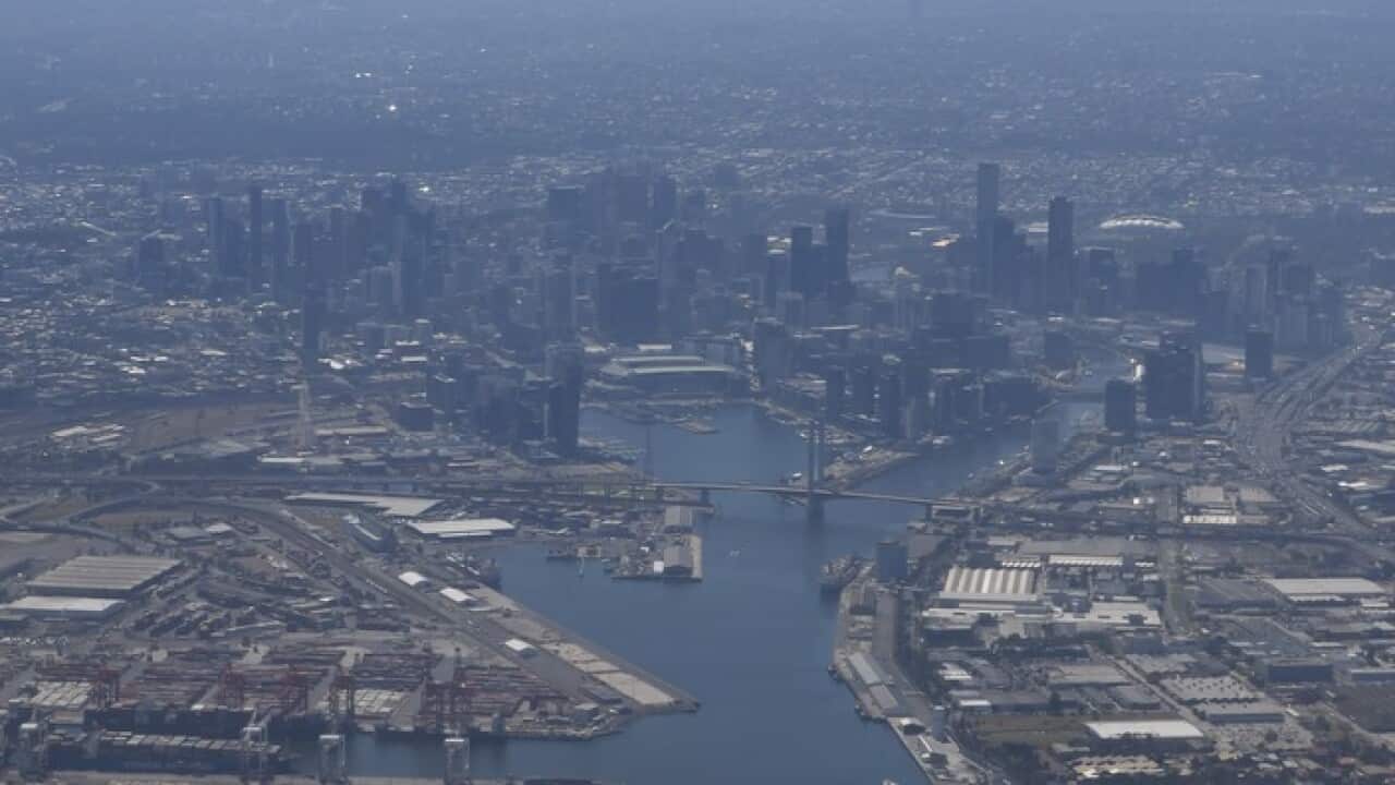 An aerial image taken from a commercial airliner shows the central business district (CBD) located in the Victorian city of Melbourne, Thursday, November 23, 2017. (AAP Image/Sam Mooy) NO ARCHIVING