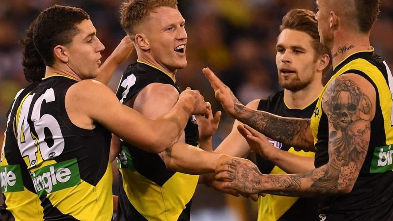Josh Caddy celebrates a goal