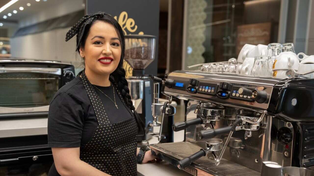 Ramina with the coffee maker.jpg