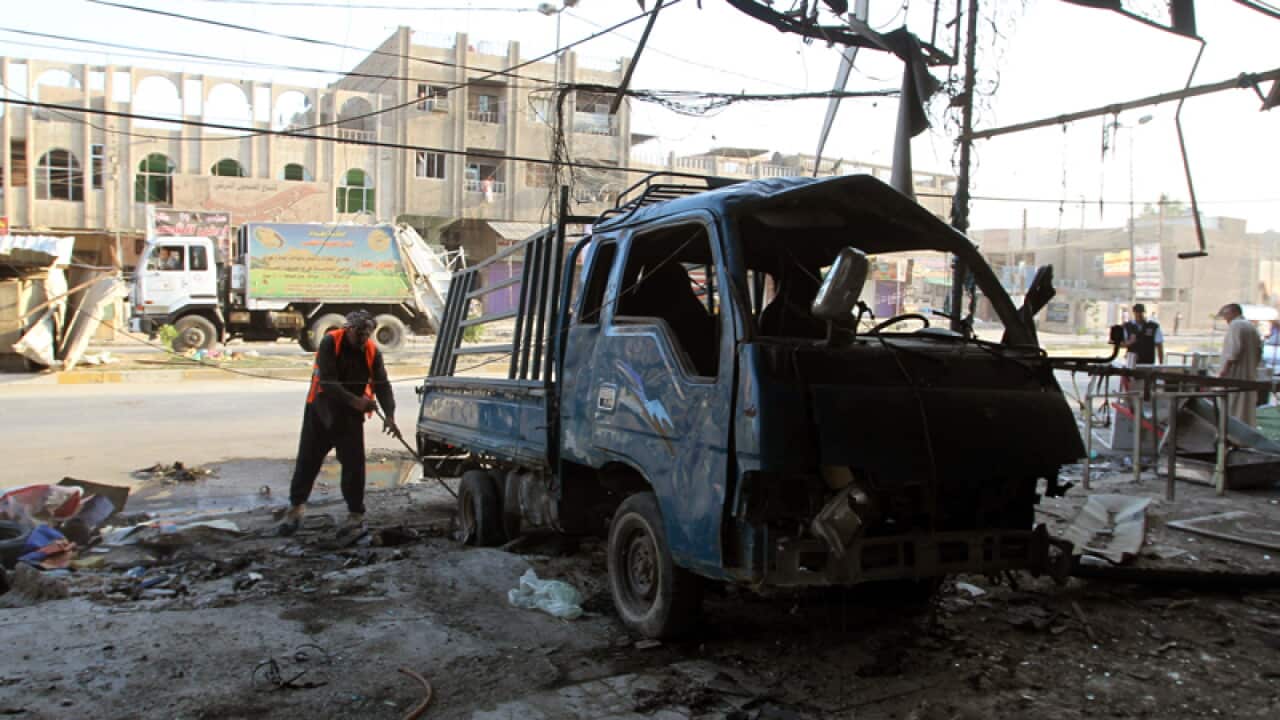 Suicide bombing kills 24 at Iraqi cafe