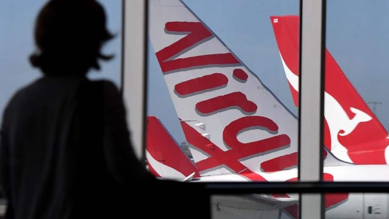 Virgin Australia and Qantas planes at Sydney Airport