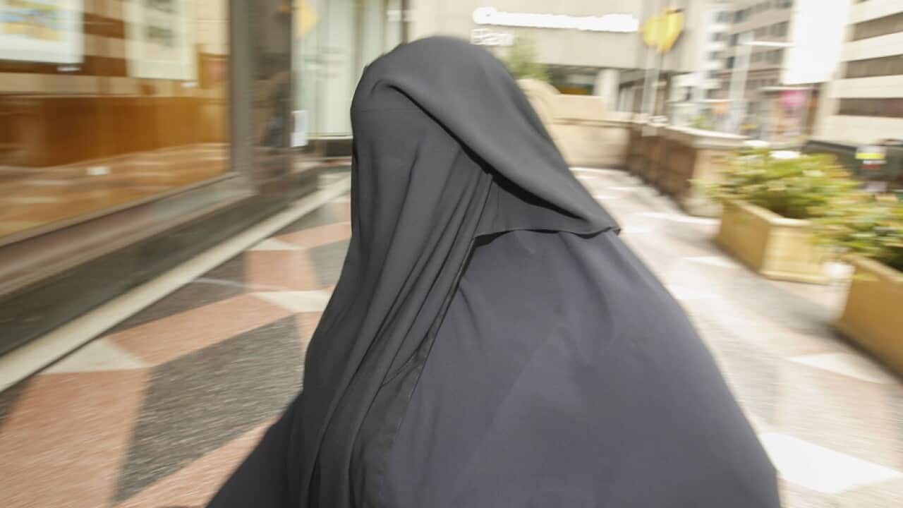 Moutia Elzahed arrives at the Downing Centre district court, in Sydney, Monday, February 19, 2018.