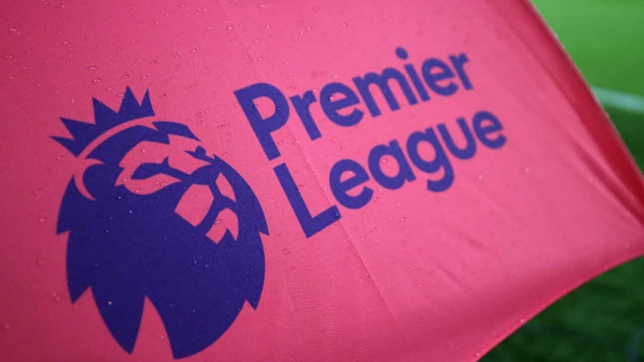 The Premier League logo is displayed on a flag before a match