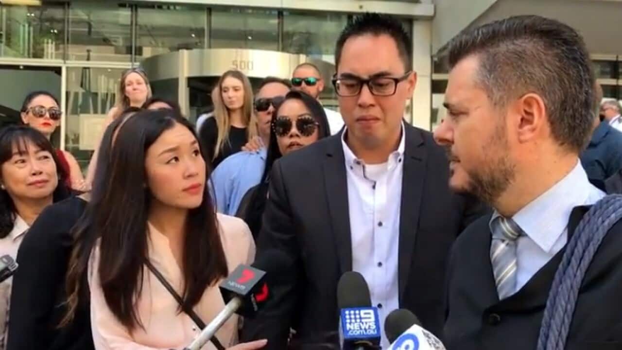 Mr Andrew Doan (middle) with his defence councel Michael Perrella in front of WA Supreme Court.