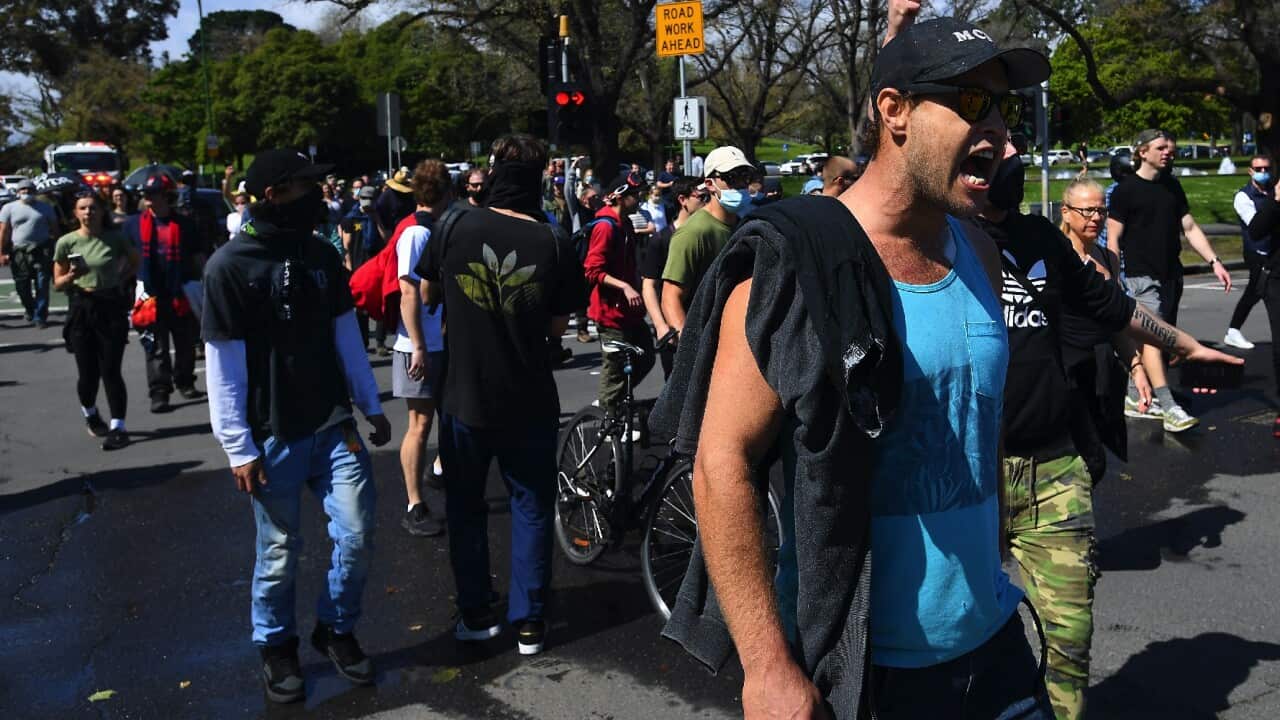 Protesters join an anti-mandatory vaccination protest in Melbourne.
