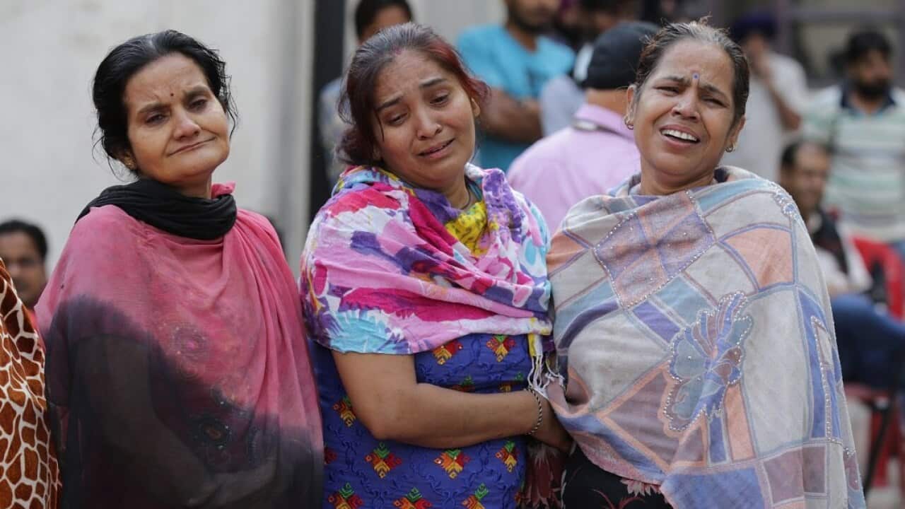 Relatives of the victims of the train disaster in Amritsar, India.