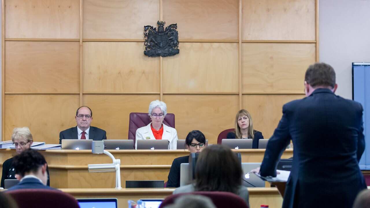 Justice Jennifer Coate (centre), Commissioner Helen Milroy (right) and Commissioner Andrew Murray at the public hearing into Institutional Responses to child abuse in Rockhampton. (AAP Image/ Royal Commission)
