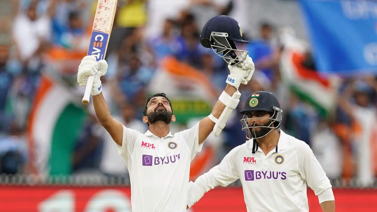 Ajinkya Rahane of India celebrates after reaching his century