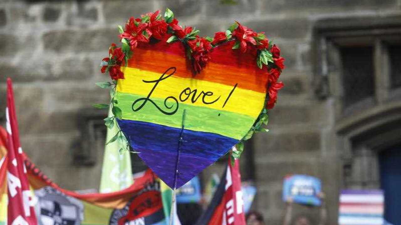 A sign is seen at a rally in support for marriage equality in Sydney on Sunday, September 10, 2017.
