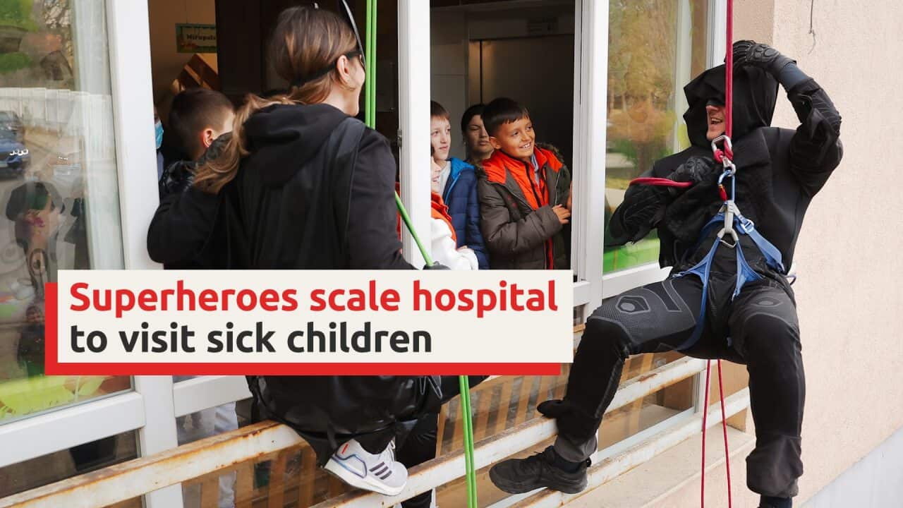 Superheroes scale hospital