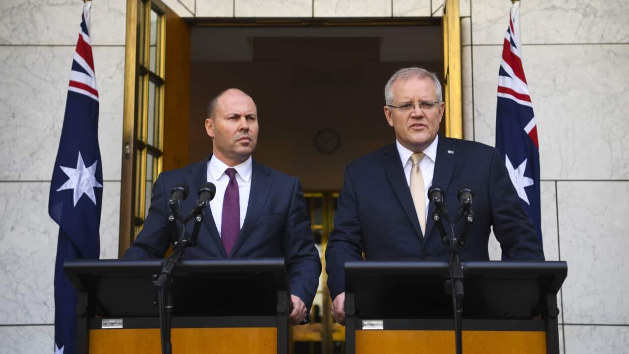 Australian Prime Minister Scott Morrison (right) and Australian Treasurer Josh Frydenberg speak to the media during a press conference at Parliament House in Canberra, Thursday, March 12, 2020. (AAP Image/Lukas Coch) NO ARCHIVING