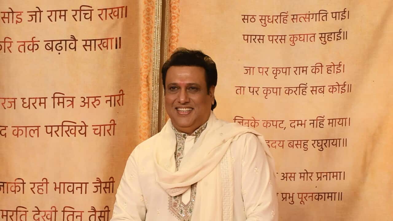 Bollywood actor Govinda poses for a photo on the red carpet