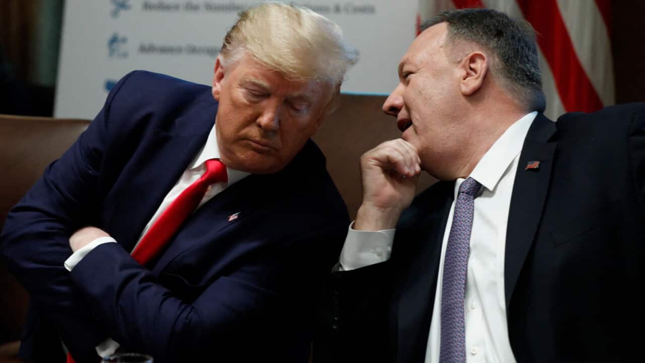 President Donald Trump listens to Secretary of State Mike Pompeo during a Cabinet Meeting at the White House