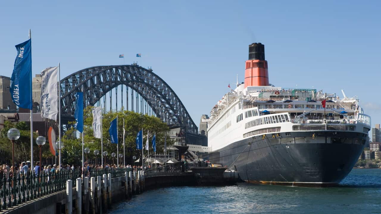 A cruise ship and sydney harbour bridge