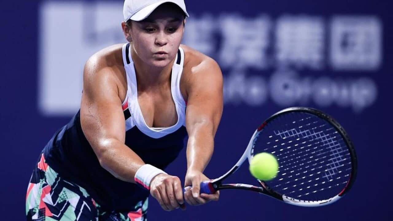 Ashleigh Barty returns a shot during WTA Elite Trophy match.