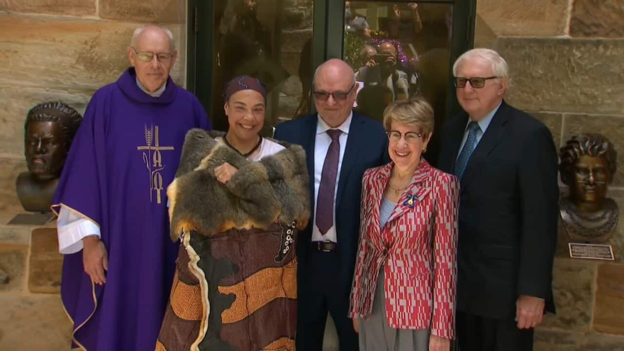 The bronze statues Bennelong and Barrangaroo are unveiled at a ceremony in Sydney.