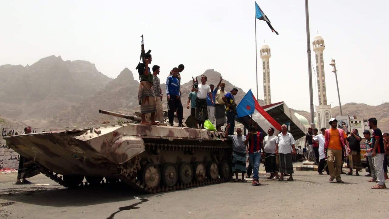 Southern Yemenis stand atop a tank of tribal militiamen loyal to Yemeni President Abdo Rabbo Mansour Hadi following clashes with Houthi fighters in the southern port city of Aden, Yemen (EPA/STRINGER)