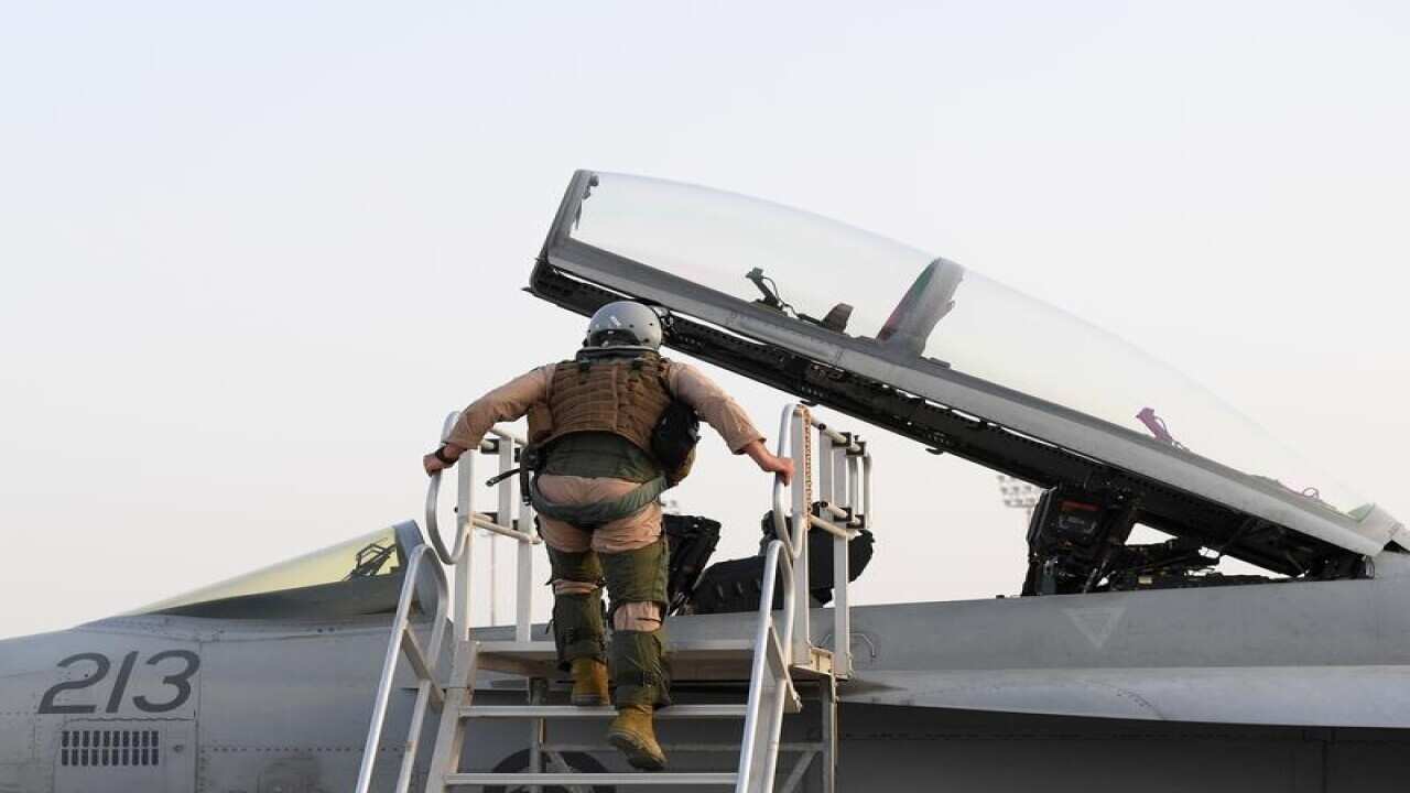 File image of a Royal Australian Air Force pilot entering an aircraft.