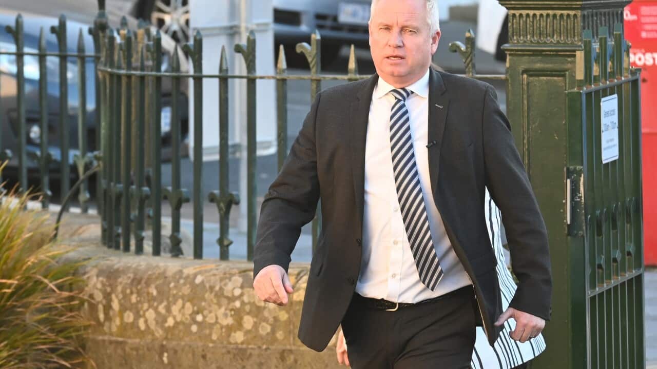 Tasmania Premier Jeremy Rockliff arrives at a press conference outside Parliament Of Tasmania in Hobart.