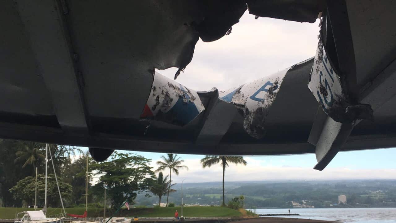 A photo from the Hawaii Department of Land and Natural Resources shows a hole in the roof of a Lava Boat Tour vessel.