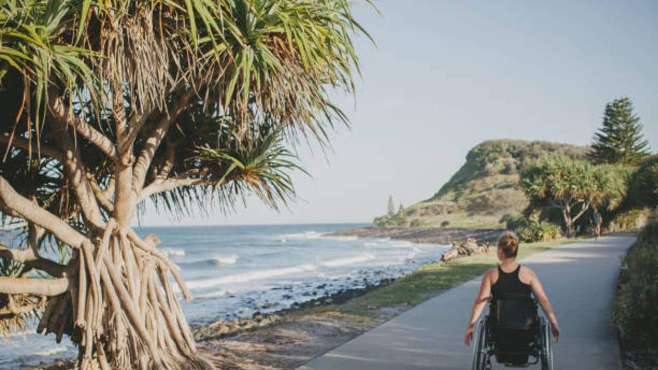 Paraplegic woman by the ocean – Getty Images / Credit: Elize Strydom.