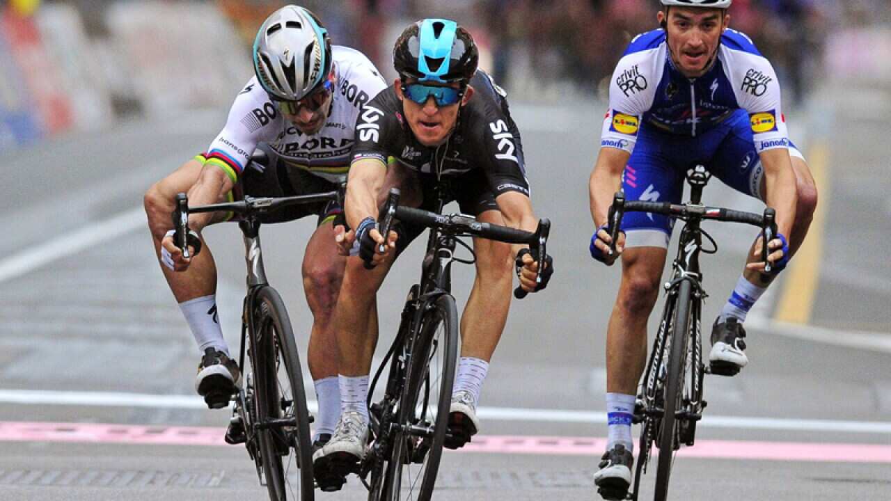 Polish rider Michal Kwiatkowski (C) in Sanremo