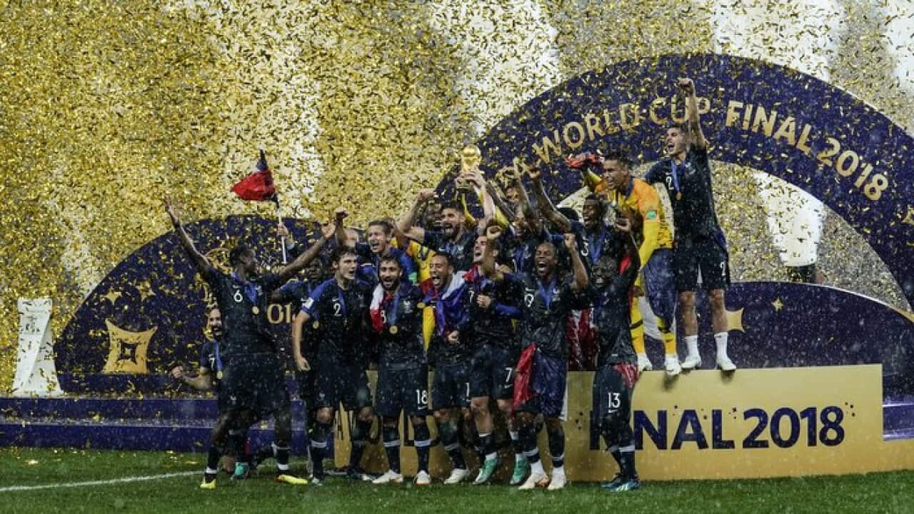 France players celebrate winning the World Cup following the 2018 FIFA World Cup Final between France and Croatia.