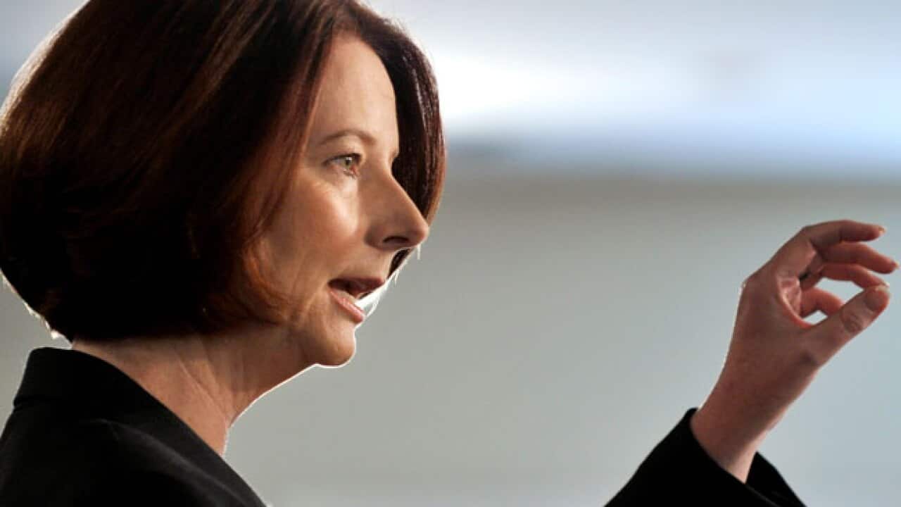 Gillard-Flood-Levy_B_AAP_819312065