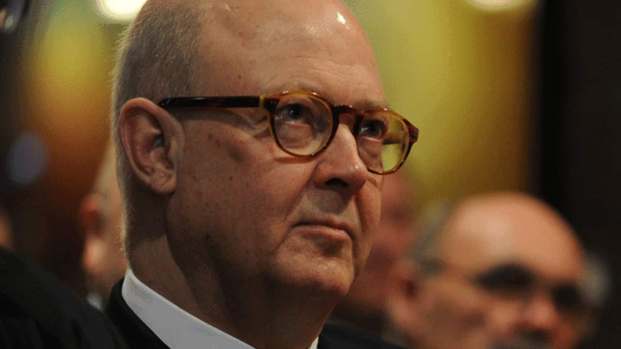 A man wearing glasses